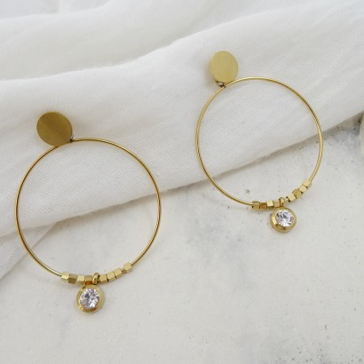 Earrings steel rings in gold with zircon stone
