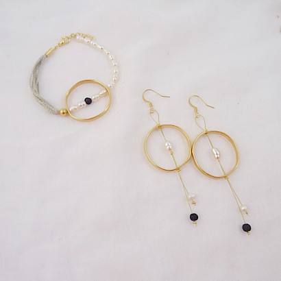 Handmade earrings with natural pearl rings and lava stone