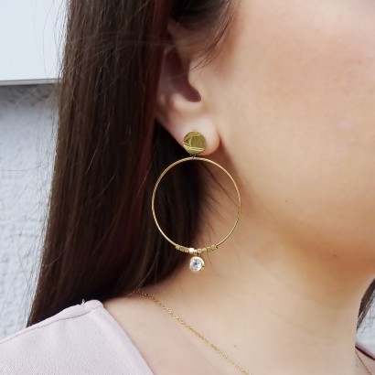 Earrings steel rings in gold with zircon stone